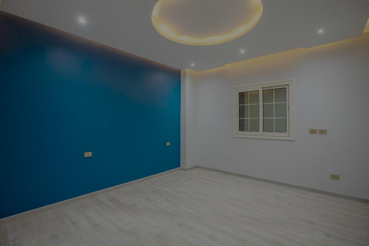 Modern Bedroom with Blue Accent